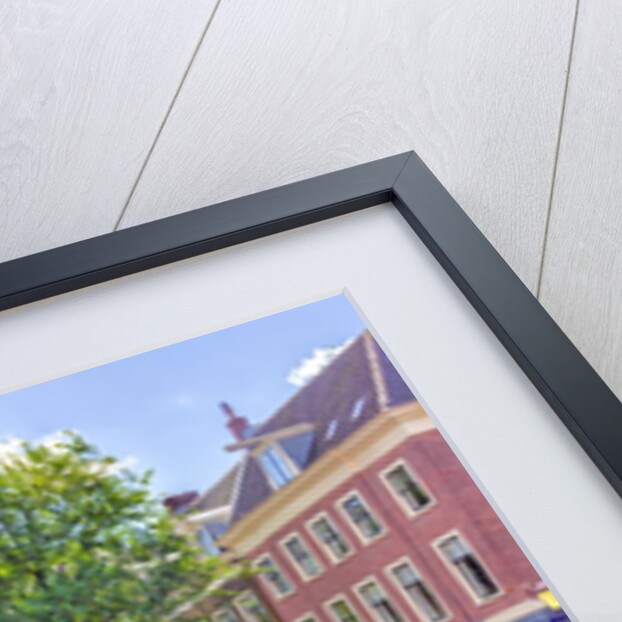 Canal through Amsterdam city by Assaf Frank